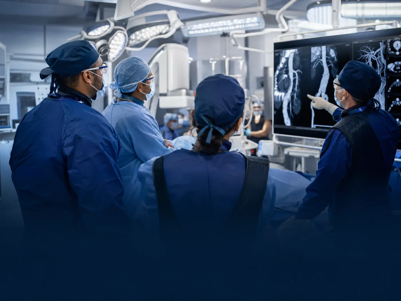 Multidisciplinary vascular team responding in a hybrid operating room